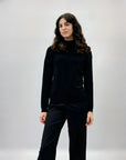 Pullover tinta unita con bottoni laterali