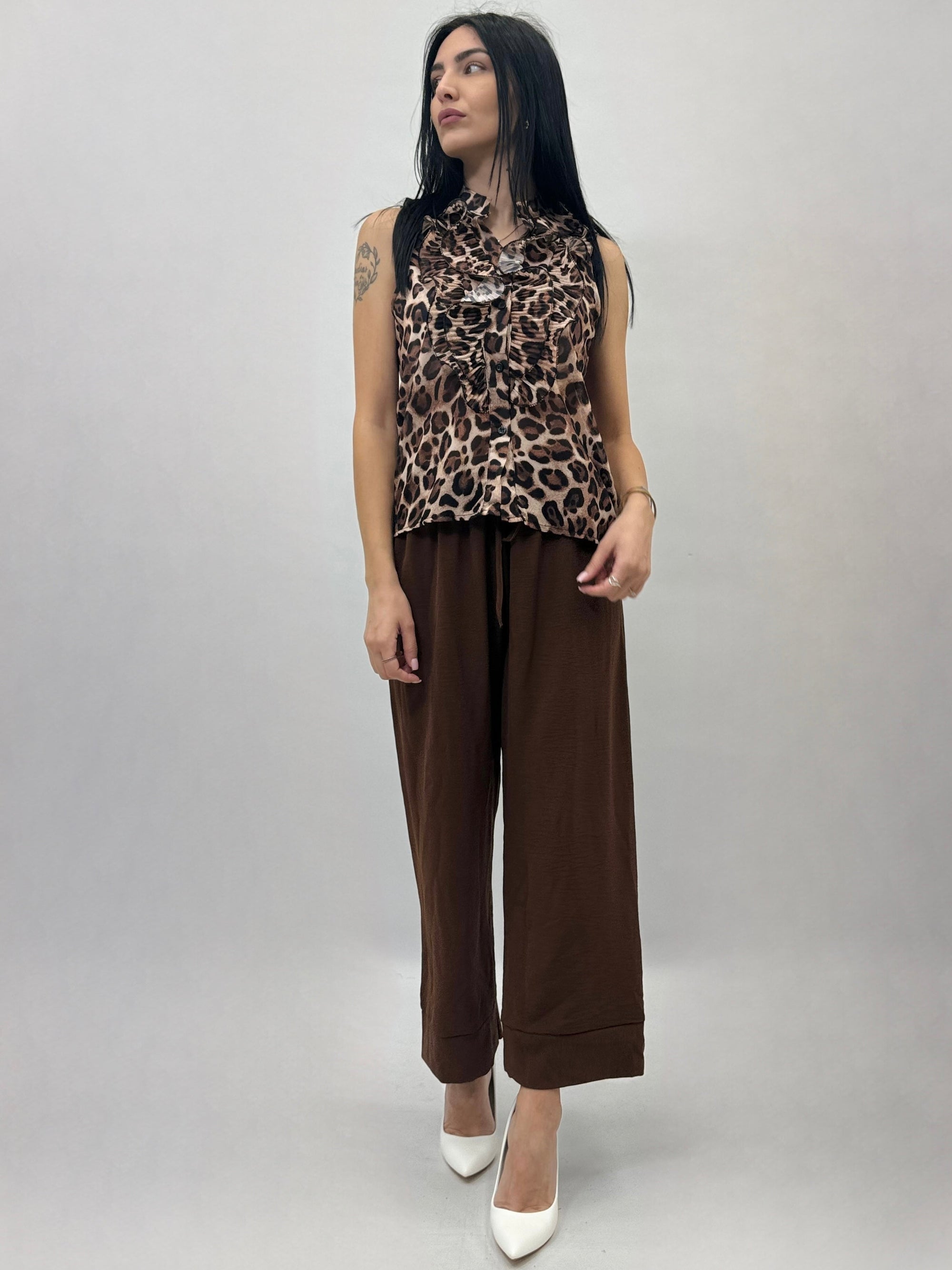 Blusa smanicata con rouches