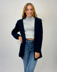 Cardigan morbido con cappuccio tinta unita