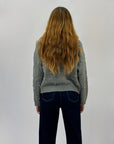Maglia con zip e cappuccio con borchie