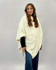 Poncho morbido peluche