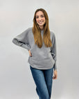 Maglione ampio con perle e strass