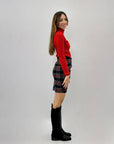 Gonna tartan con drappeggio
