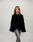 Maglione con bottoni over