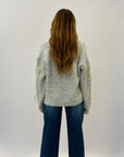 Maglione con fiocchi