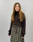 Maglione dolcevita con intrecci