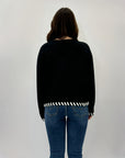 Pullover morbido con dettagli