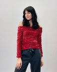 Maglietta con paillettes e scollo a bardot