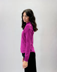 Pullover tinta unita con bottoni laterali