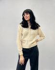 Cardigan con paillettes e zip
