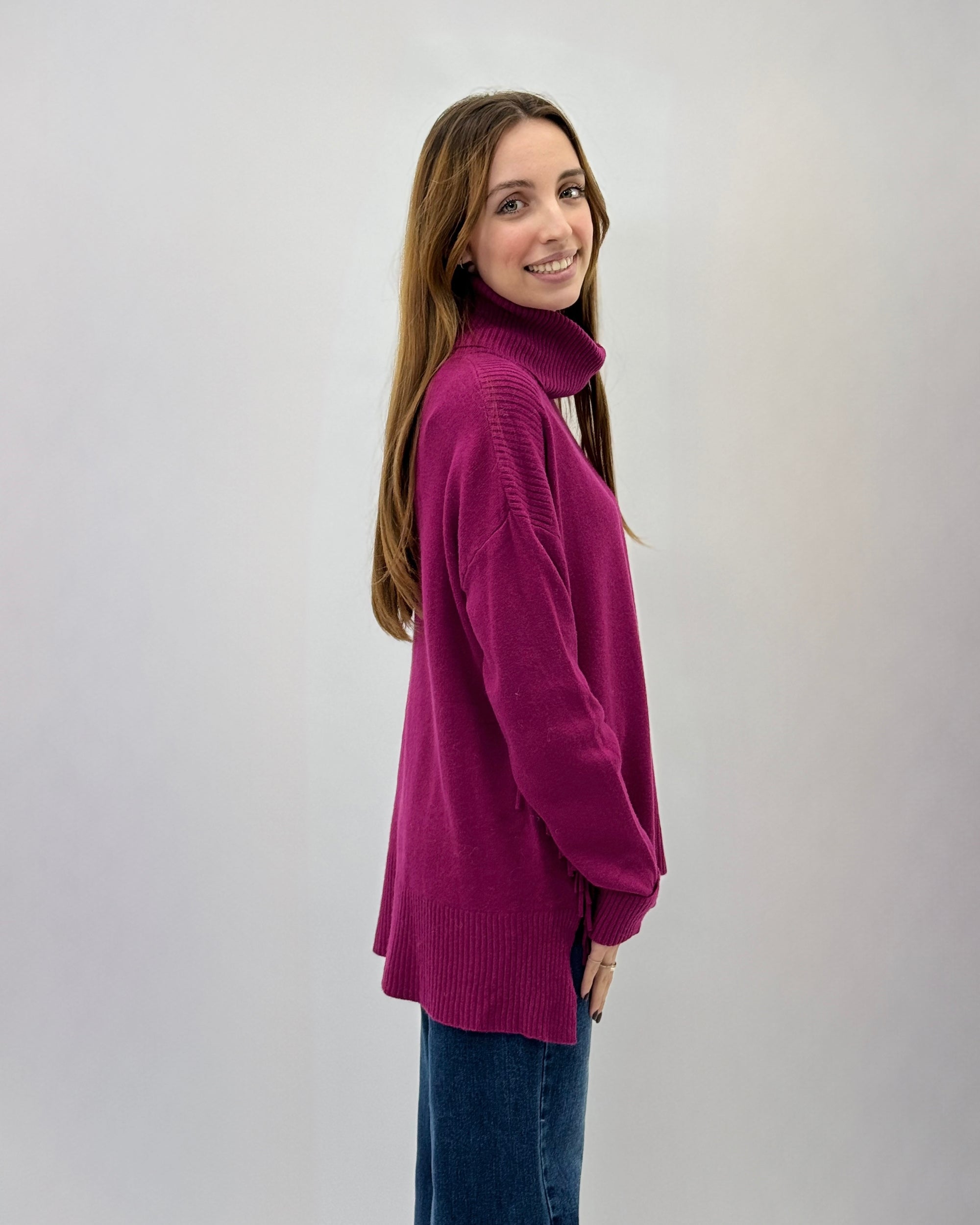 Maglione collo alto con frange