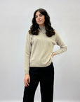 Pullover tinta unita con bottoni laterali