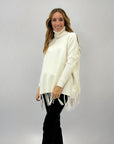 Pullover dolcevita con frange