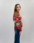 Maglione natalizio con renne e fiocchi di neve