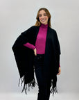Poncho morbido tinta unita con frange