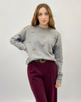 Pullover fiocchietti ricamati