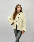 Maglione con bottoni over