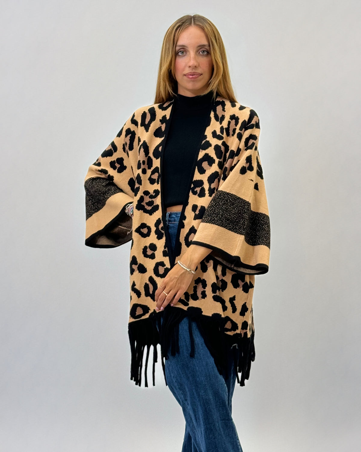 Poncho con stampa maculata
