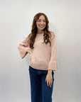 Maglia con perle sulle maniche