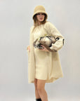 Cappotto morbido con dettaglio cuore