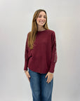 Maglione ampio con perle e strass