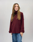 Maglione dolcevita ampio con tasche