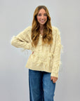 Maglione con fiocchi