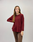 Maglione ampio con tasche frontali