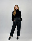 Maglione dolcevita con intrecci