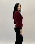 Maglia scollo barchetta intrecci