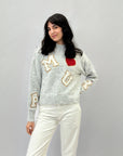 Maglione misto lana con stampe lettere e cuore