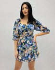 Abito con pantaloncino con fantasia fiori