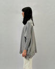 Maglione dolcevita ampio con frange