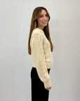 Maglione con paillettes