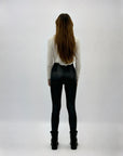 Leggings felpati in ecopelle con vita elasticizzata
