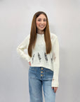 Pullover crop con strappi