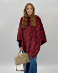 Poncho morbido peluche