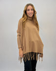 Pullover dolcevita con frange