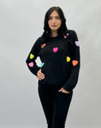 Maglione con cuori ricamati