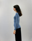 Maglia costine con scollo particolare