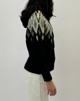 Maglione con cappuccio stampa jacquard