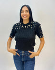Maglia intrecciata con dettagli gioielli