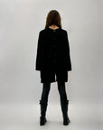 Pullover ampio con bottoni dietro