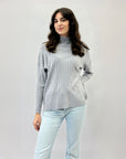 Pullover comodo lupetto con dettaglio