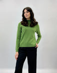 Pullover tinta unita con bottoni laterali
