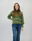 Maglione lupetto con dettagli frange