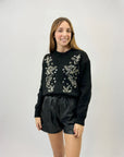 Maglione morbido con decorazioni
