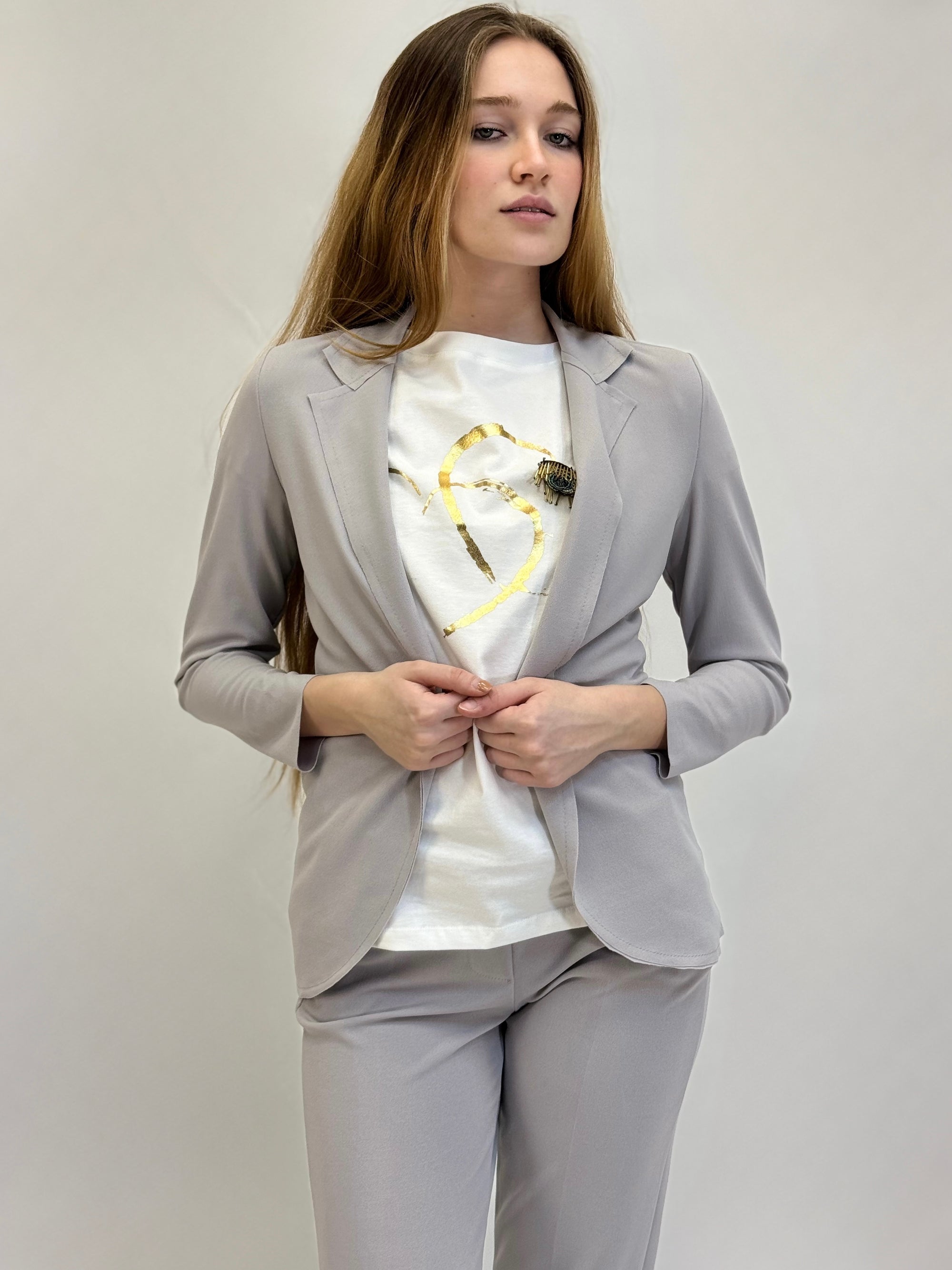 Pantaloni a sigaretta con svolta