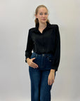 Camicia con spalle imbottite