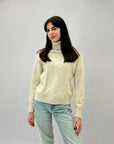 Maglione dolcevita con tre intrecci